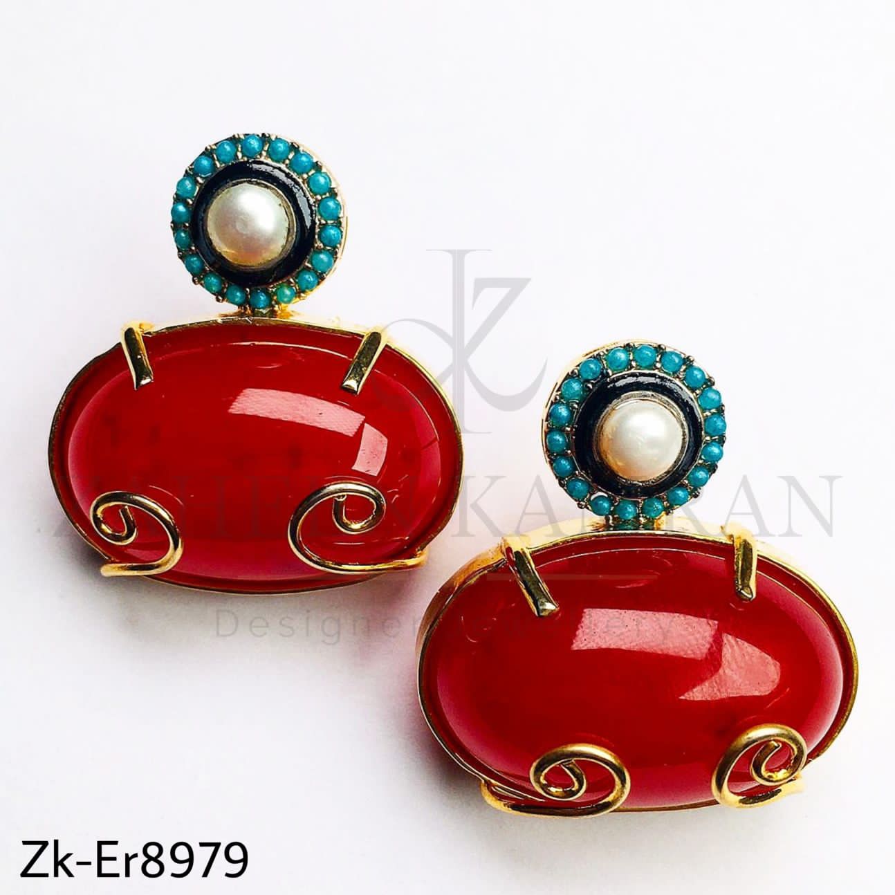 Twirl garnet earrings.