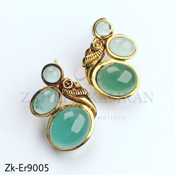 Oval styli earrings.