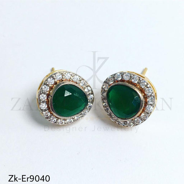 Classy emerald studs.