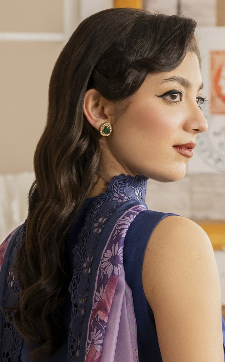 Classy emerald studs.