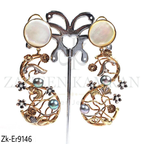 S shape earrings.