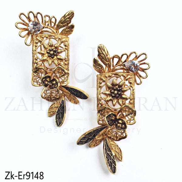 Wing style earrings.