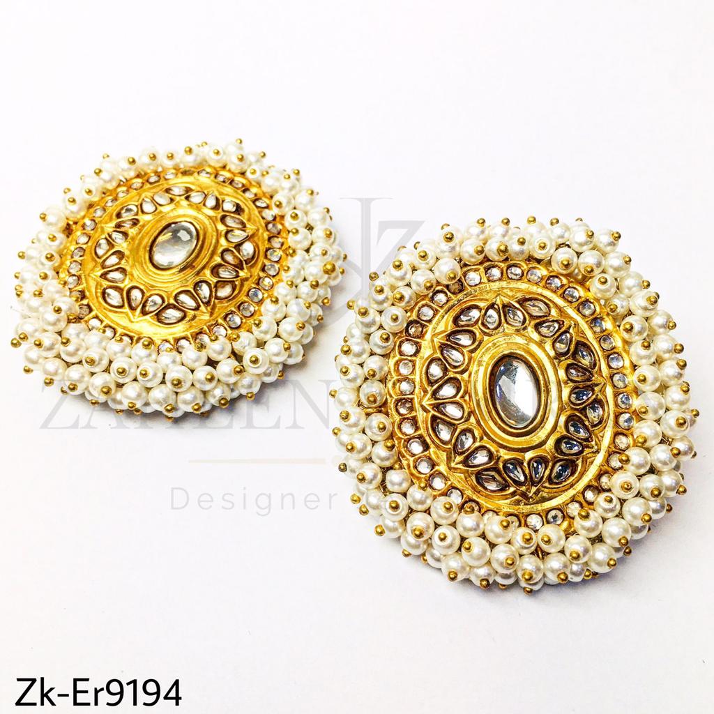 Pearly cluster earrings.