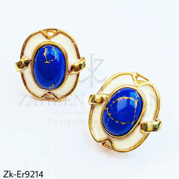 Stylish golden earrings.