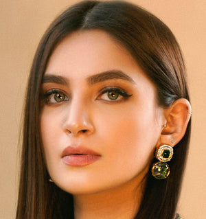 Big stone earrings.