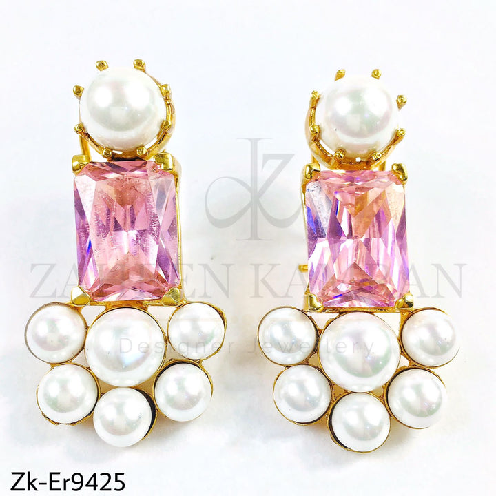 Pearls earrings.
