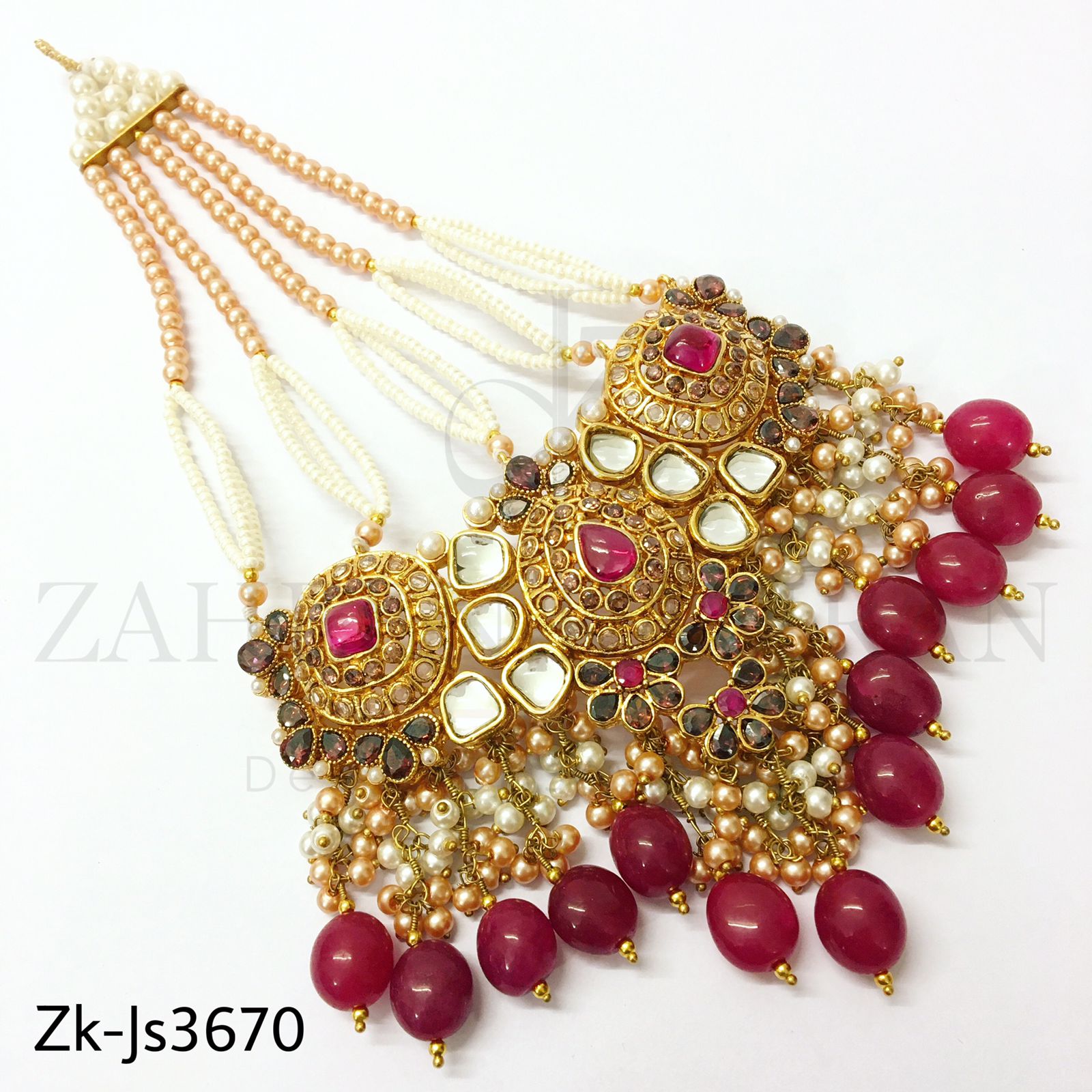 Glossy red kundan set