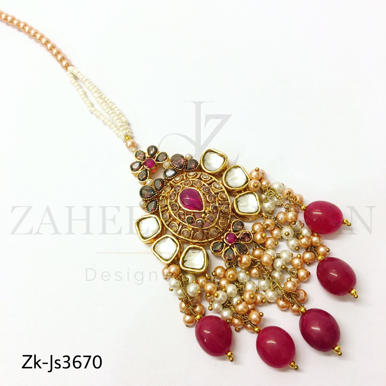 Glossy red kundan set