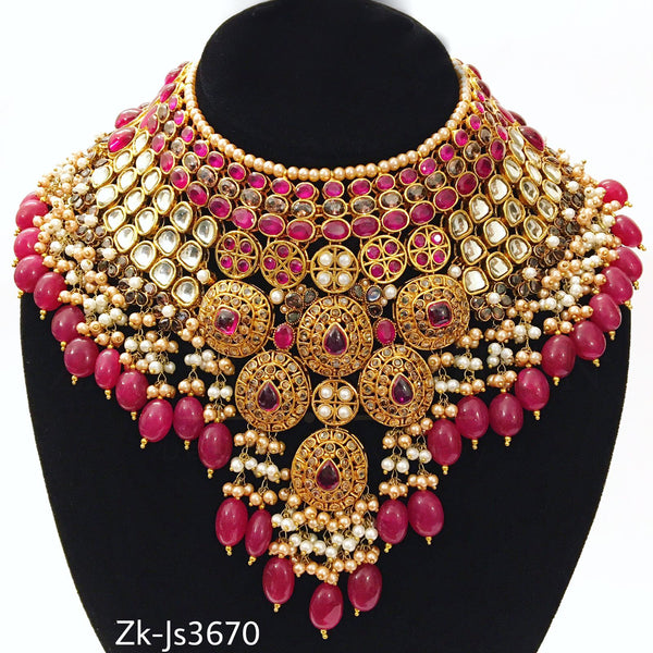 Glossy red kundan set