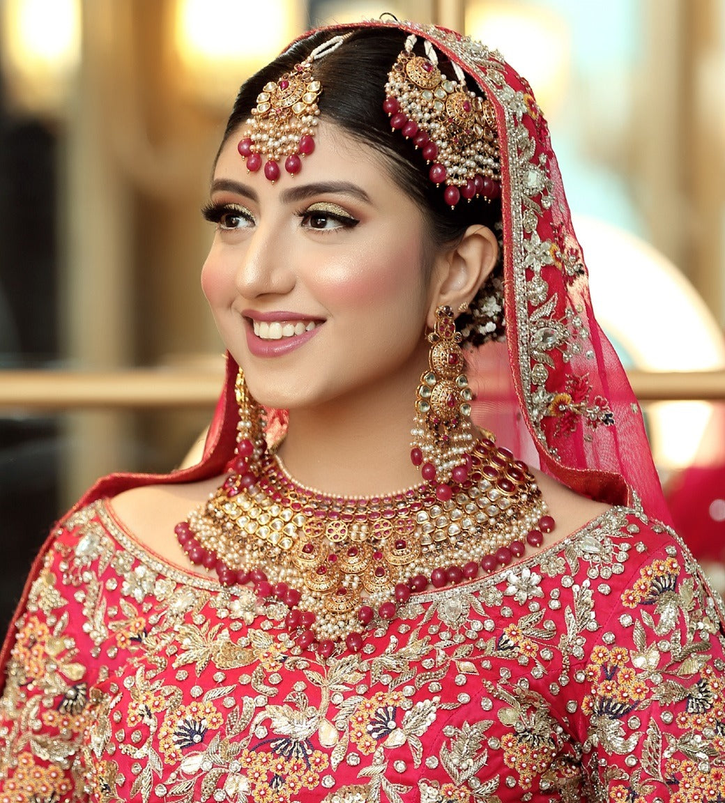 Glossy red kundan set