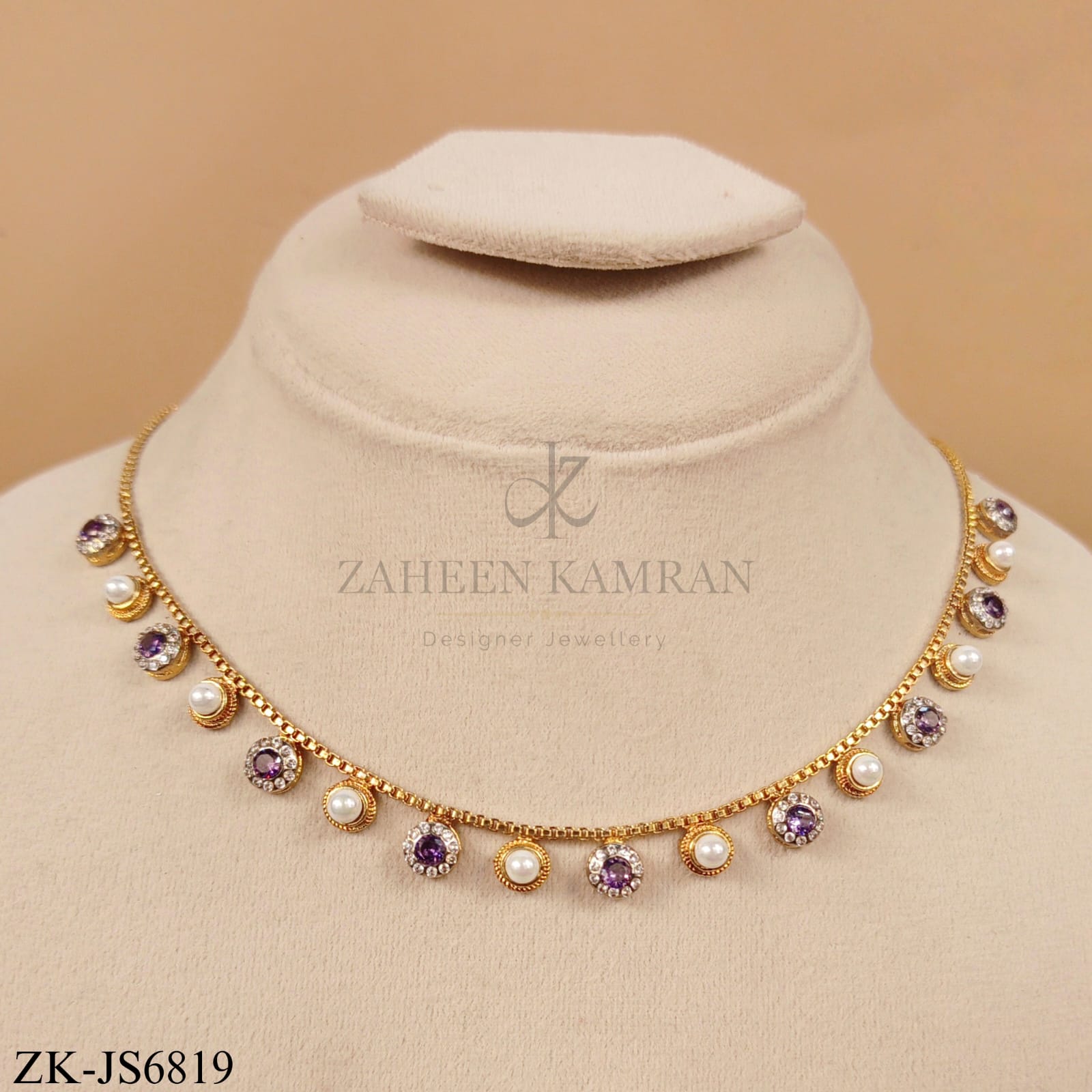 LUXURIOUS AMETHYST SET IN FLORAL SETTINGS