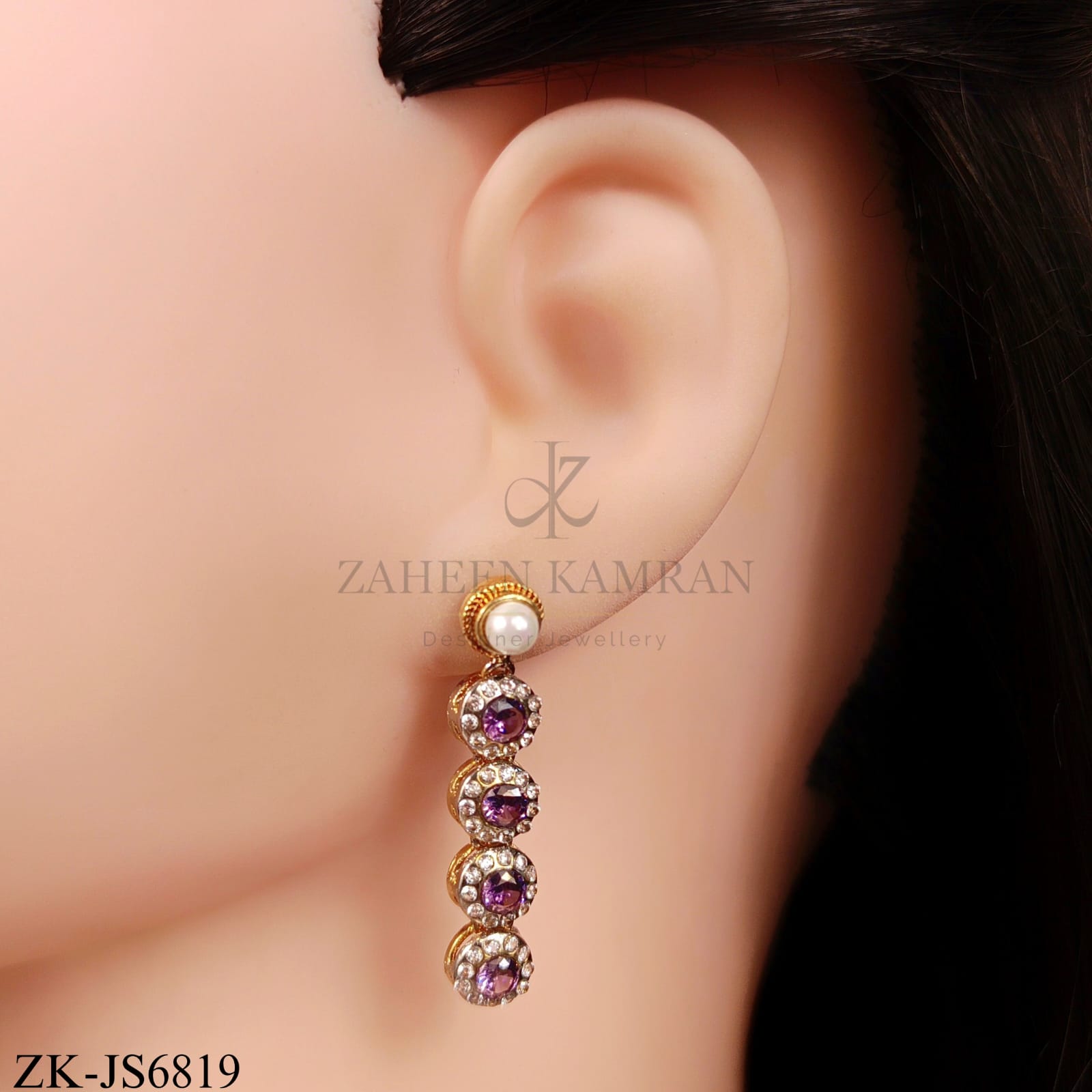 LUXURIOUS AMETHYST SET IN FLORAL SETTINGS