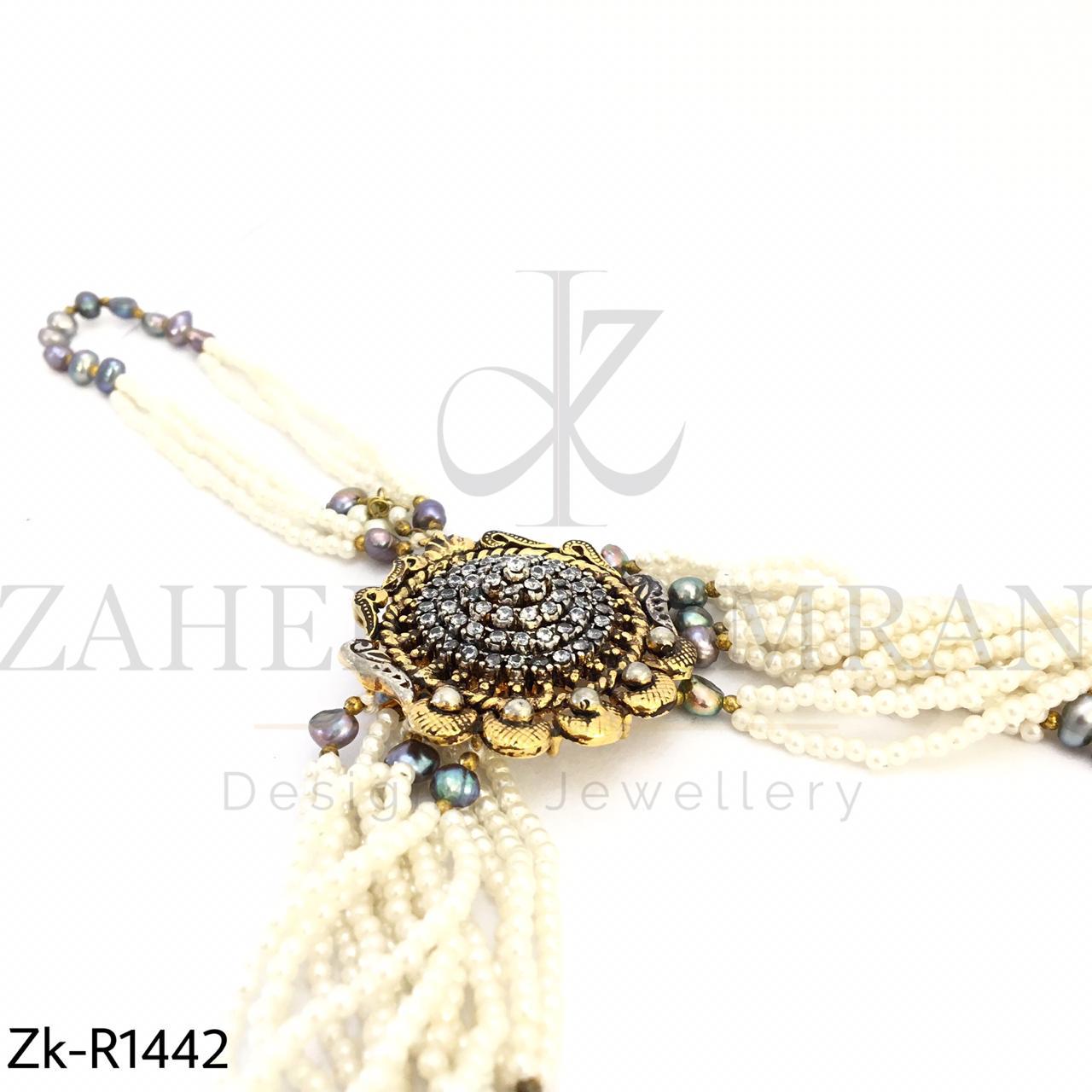 Hand woven pearls angla