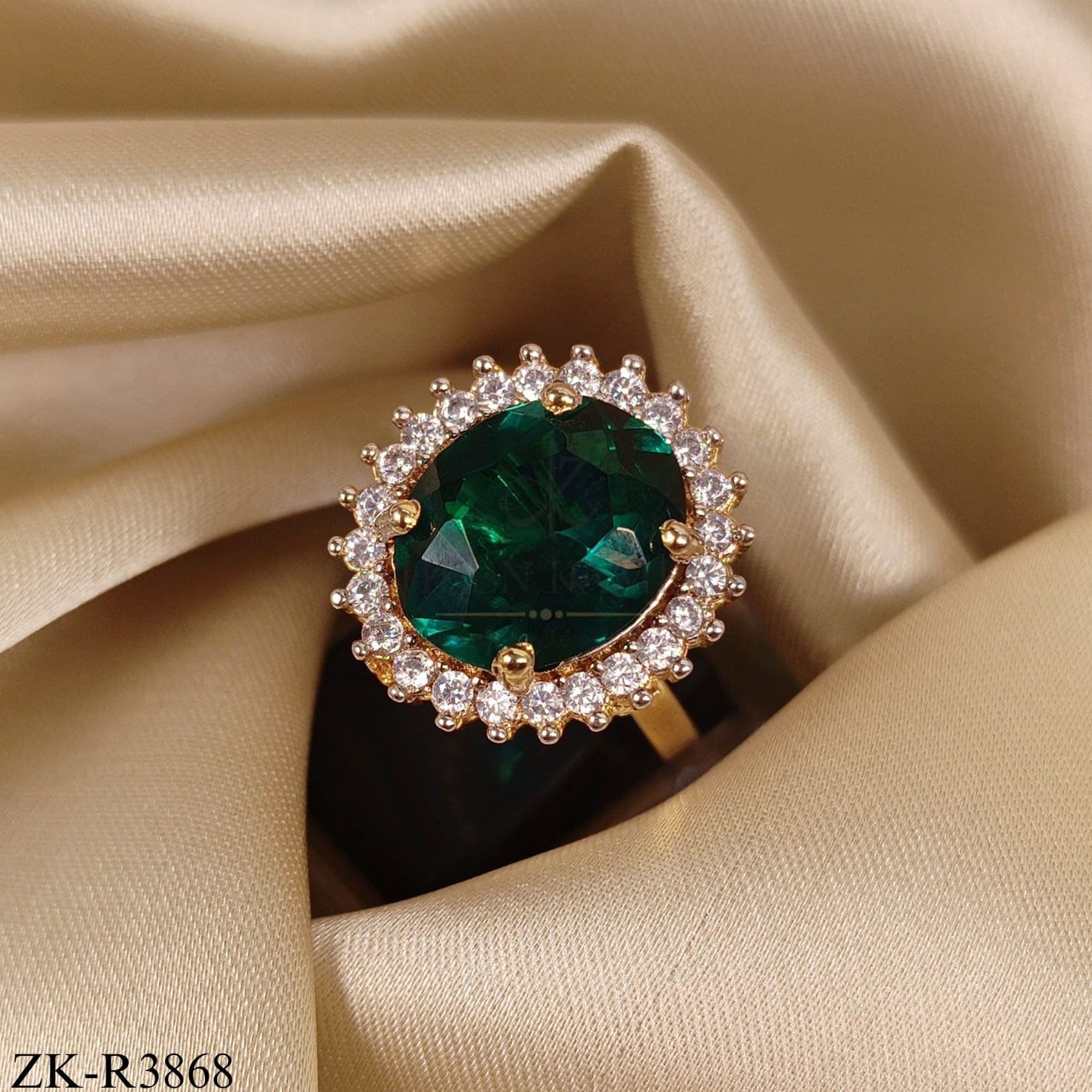 OVATE EMERALD RING WITH ZIRCONIA