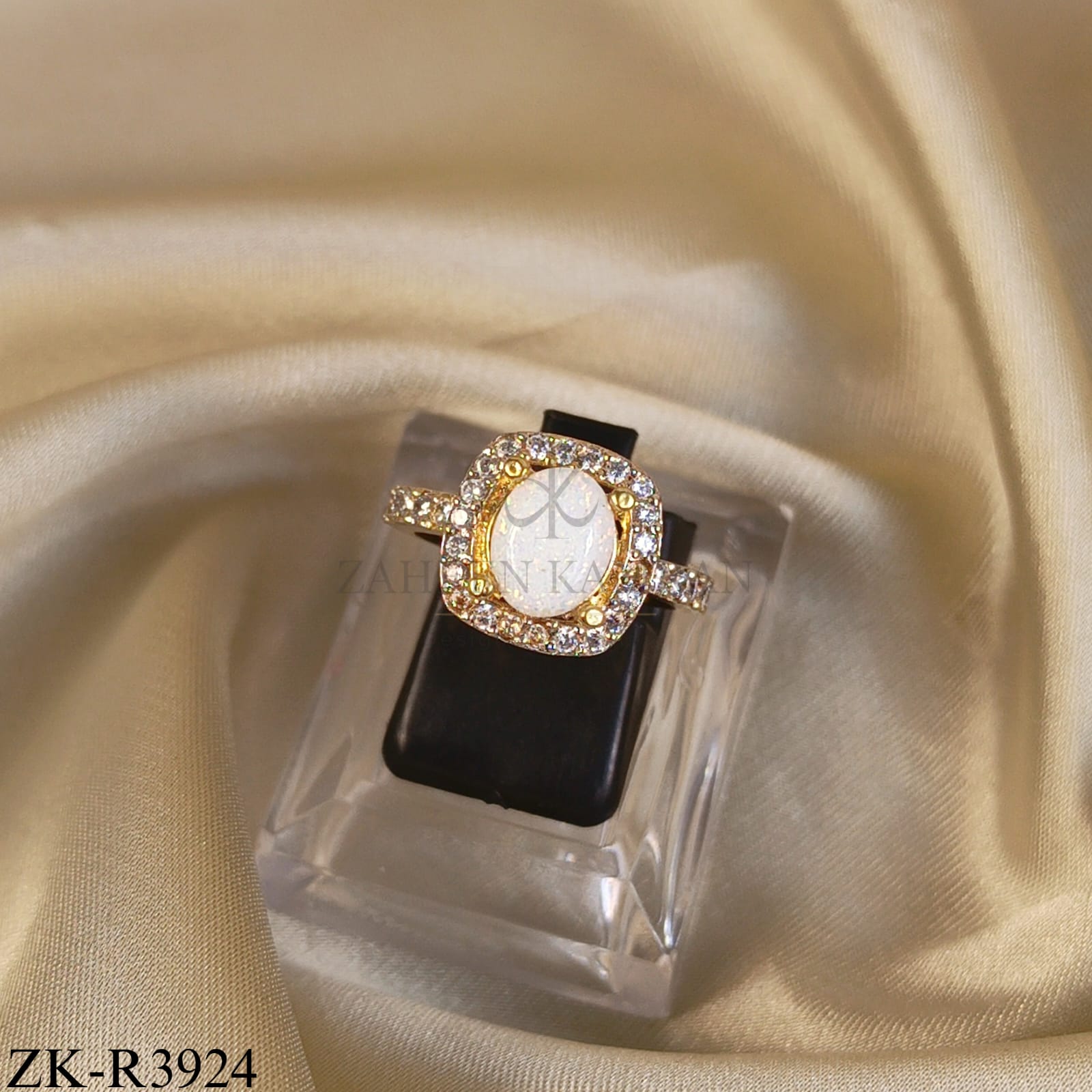 WHITE OPAL OVATE HALO RING