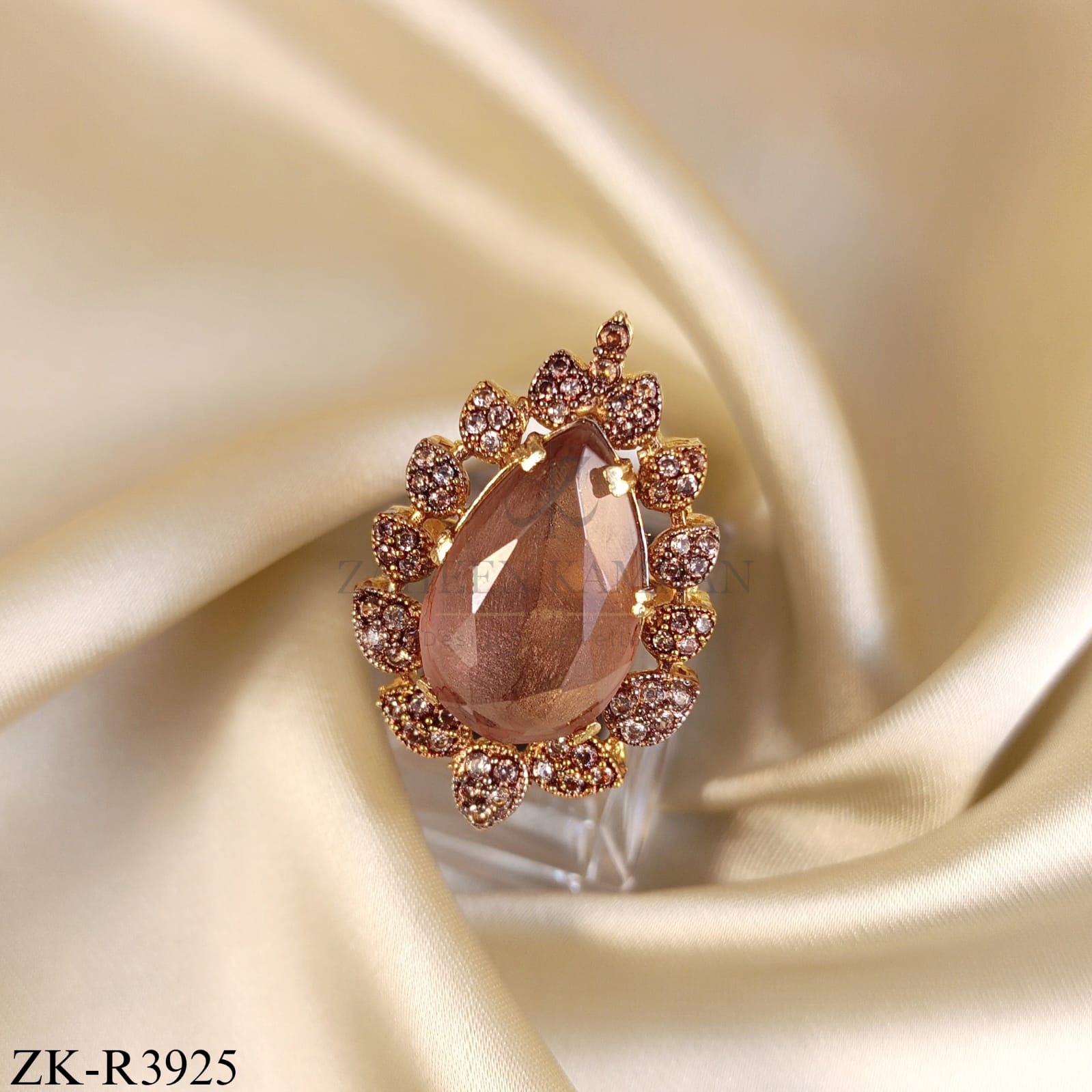 GOLDEN COFFEE RING WITH HALO LEAF ACCENTS
