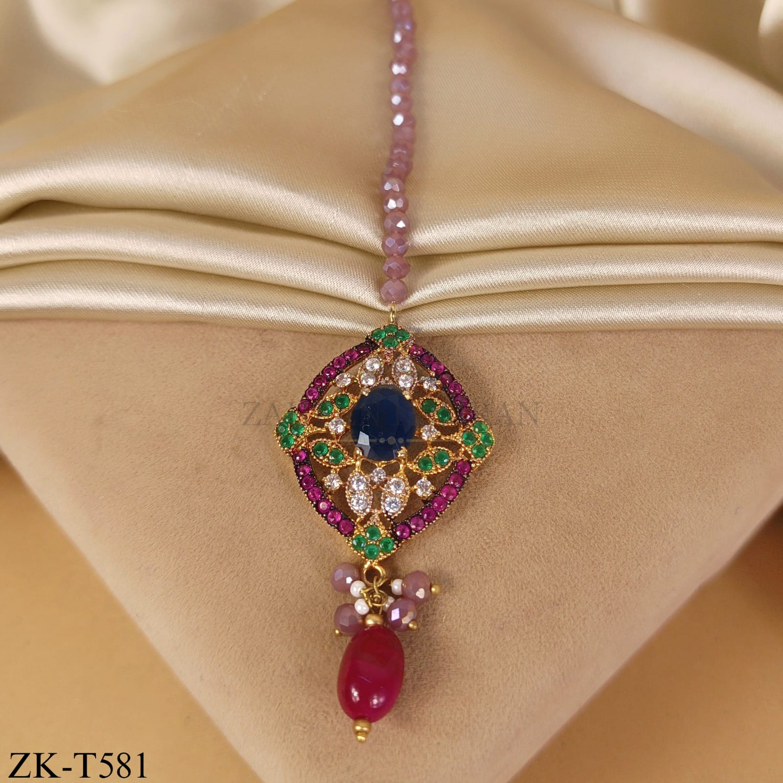TIKKA WITH MULTI COLOUR STONES