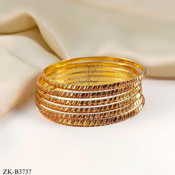 GOLDEN BANGLES