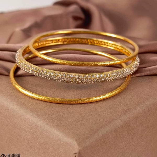 SLEEK GOLDEN BANGLES