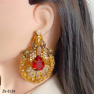 GARNET EARRINGS AND TIKKA